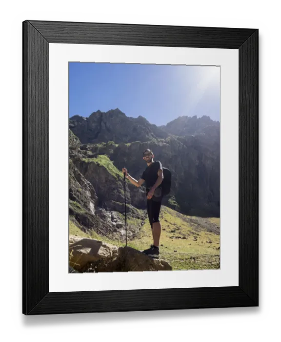 Framed Print : Hiker walking with a stick by a mountain area of Gavarnie, at a time of rest Framed Print : Hiker walking with a stick by a mountain area of Gavarnie, at a time of rest