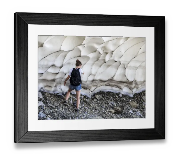 Framed Print : Woman Mountaineer on a glacier snow on a break using the mobile phone Framed Print : Woman Mountaineer on a glacier snow on a break using the mobile phone