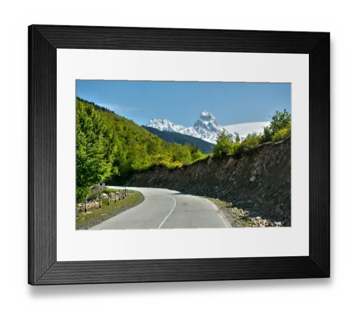 Framed Print : Mountain road at Mount Ushba in the Caucasus of Georgia Framed Print : Mountain road at Mount Ushba in the Caucasus of Georgia
