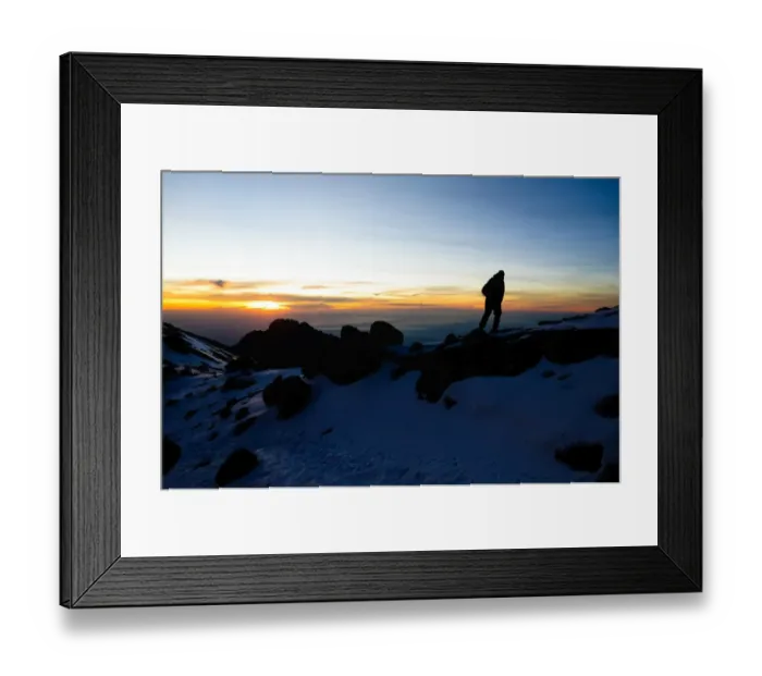 Framed Print : Climber Summiting Mt. Kilimanjaro Framed Print : Climber Summiting Mt. Kilimanjaro