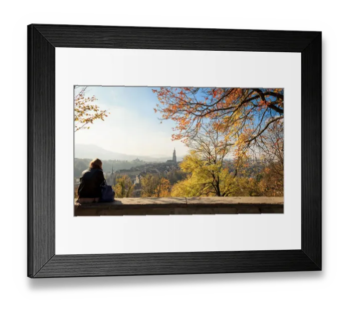 Framed Print : A girl sitting to enjoy scenery of the Old City of Bern at rose garden Framed Print : A girl sitting to enjoy scenery of the Old City of Bern at rose garden