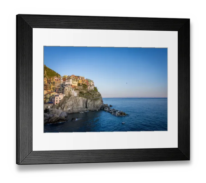 Framed Print : The village of Manarola at the sunset, Liguria. Italy Framed Print : The village of Manarola at the sunset, Liguria. Italy