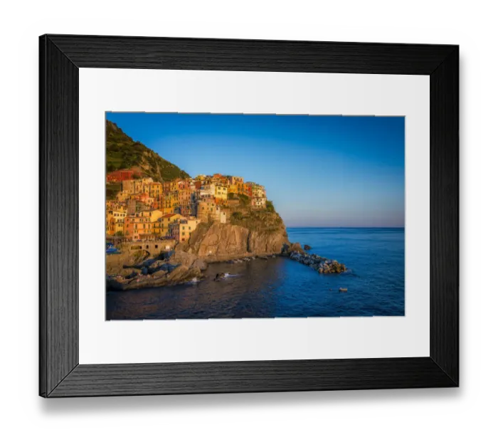 Framed Print : The village of Manarola at the sunset, Liguria. Italy Framed Print : The village of Manarola at the sunset, Liguria. Italy