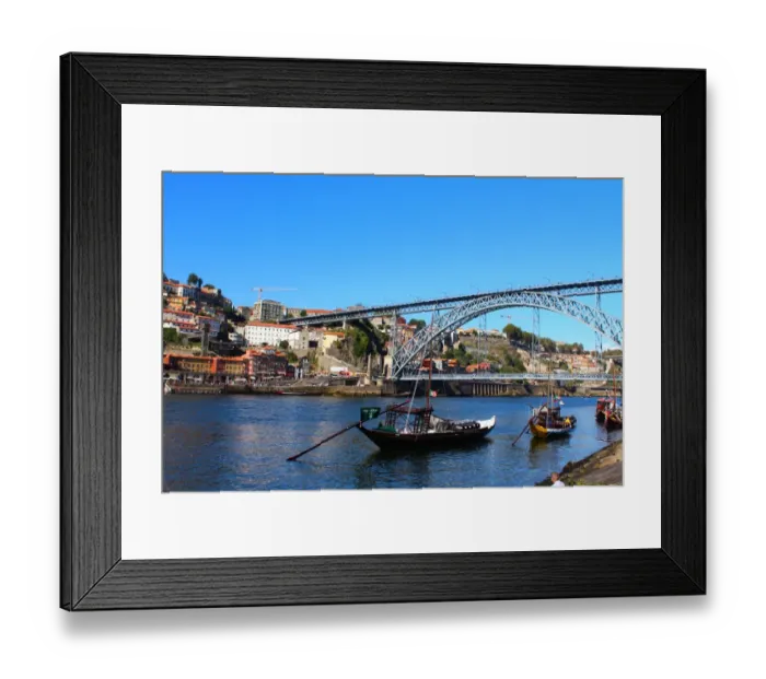 Framed Print : Dom LuAis I Bridge and a Rabelo boat in Porto Framed Print : Dom LuAis I Bridge and a Rabelo boat in Porto