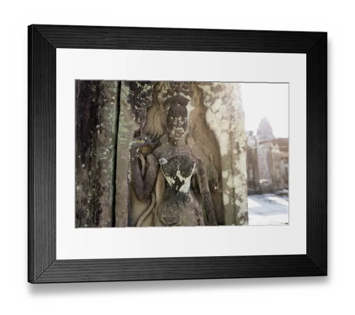 Framed Print : Ramayana and buddha carving face of bayon temple the poppular temple angkor thom Framed Print : Ramayana and buddha carving face of bayon temple the poppular temple angkor thom