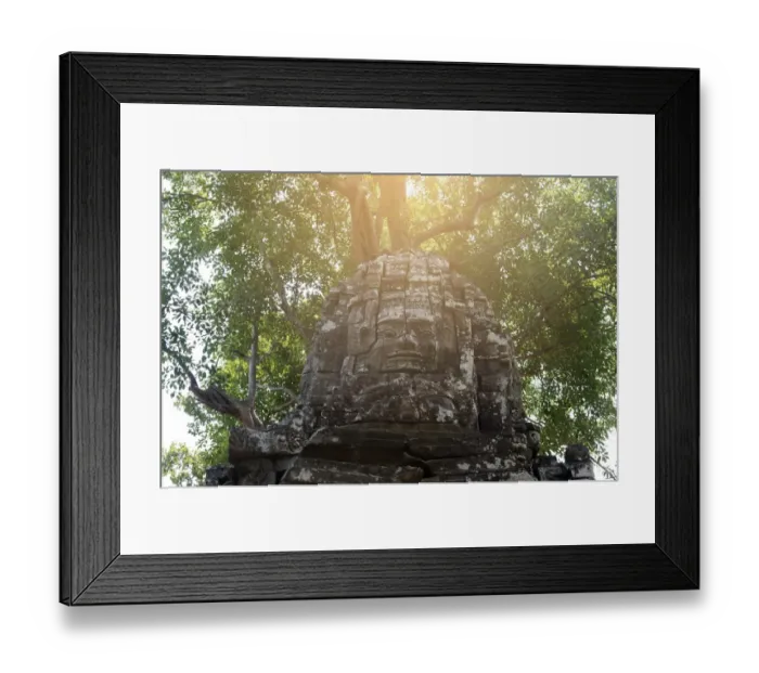 Framed Print : buddha carving face of bayon temple the poppular temple Framed Print : buddha carving face of bayon temple the poppular temple