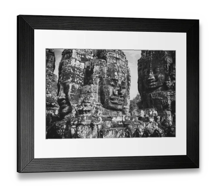 Framed Print : black and white buddha carving face of bayon temple the poppular temple