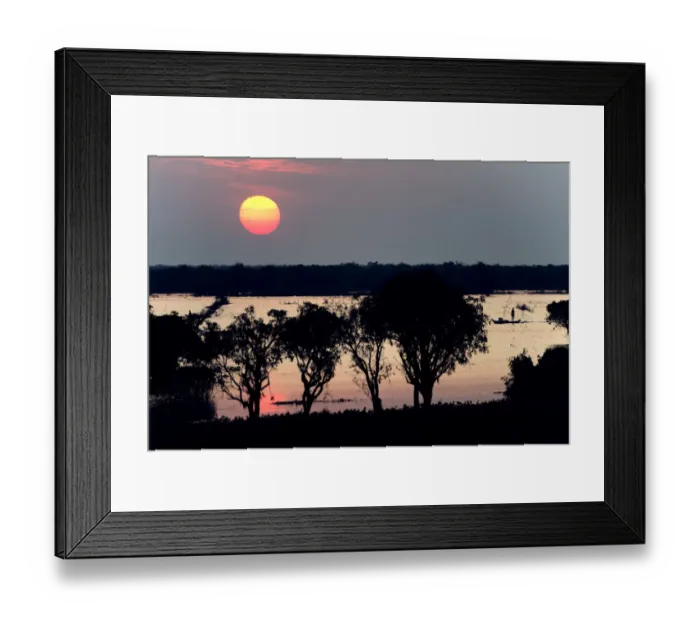 Framed Print : the Sun coming down over tonle sap lake and Fisherman fishing on the boat Framed Print : the Sun coming down over tonle sap lake and Fisherman fishing on the boat
