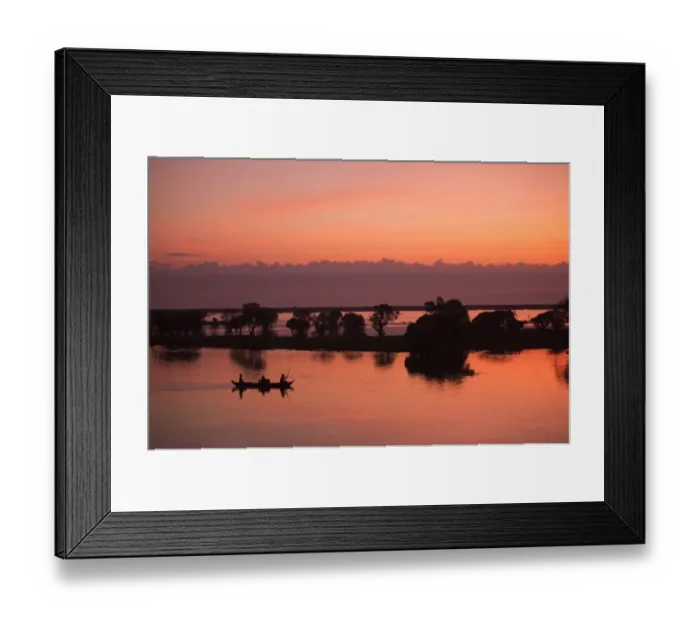 Framed Print : Sunrise sky over tonle sap lake and Fisherman fishing on the boat Framed Print : Sunrise sky over tonle sap lake and Fisherman fishing on the boat