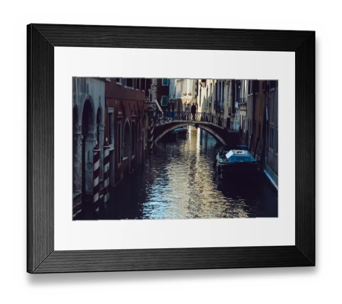 Framed Print : Couple standing on the bridge above canal in Venice, Italy Framed Print : Couple standing on the bridge above canal in Venice, Italy