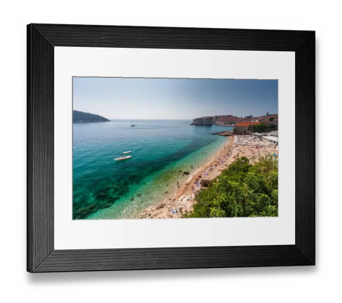 Framed Print : Dubrovnik, Croatia. Beach view with city in background Framed Print : Dubrovnik, Croatia. Beach view with city in background