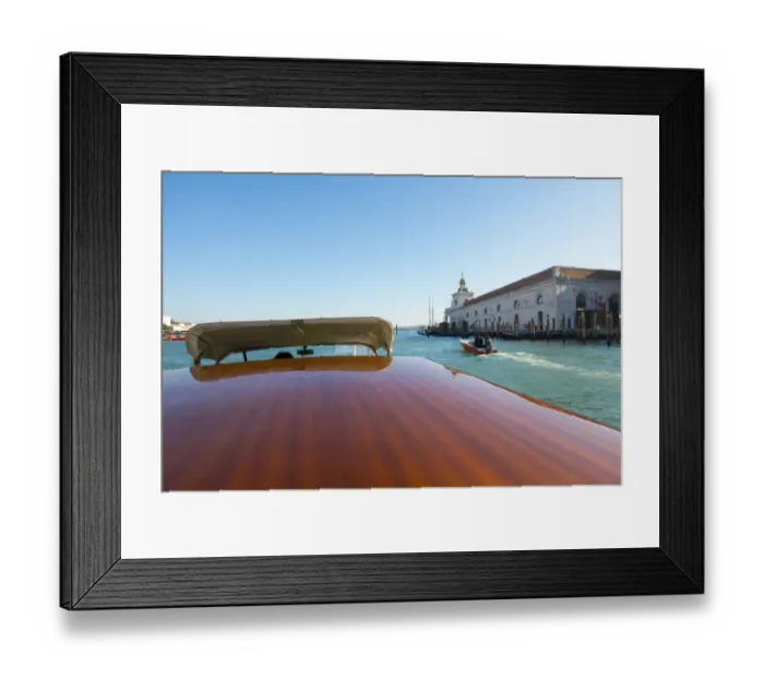 Framed Print : Taxi boat on Grand Canal and old customs building in Venice, Italy Framed Print : Taxi boat on Grand Canal and old customs building in Venice, Italy