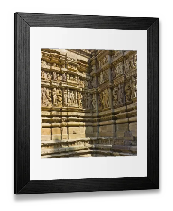 Framed Print : Artistic sculptures of Parshvanatha Temple, Khajuraho, Chhatarpur District, Madhya Pradesh, India Framed Print : Artistic sculptures of Parshvanatha Temple, Khajuraho, Chhatarpur District, Madhya Pradesh, India