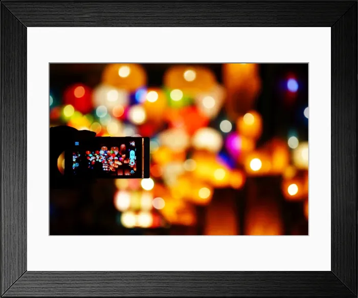 Framed Print : Hoi An lanterns through phone Framed Print : Hoi An lanterns through phone