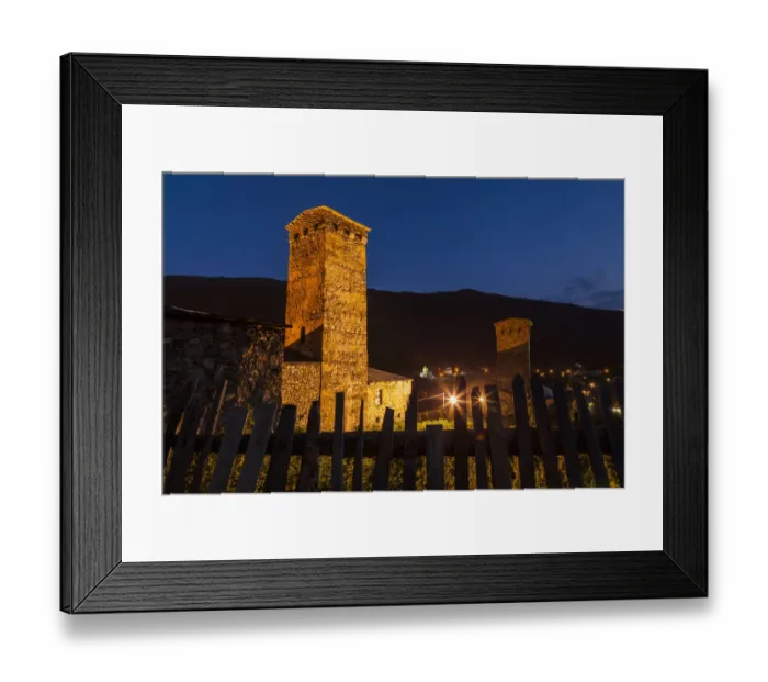 Framed Print : Svan towers illuminated at night. Svaneti, Georgia