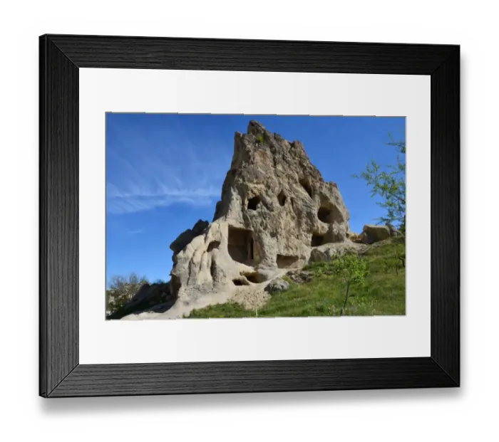 Framed Print : Ancient rock dwellings in Cappadocia, Turkey