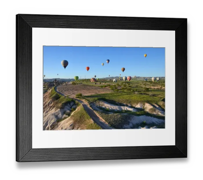 Framed Print : Hot Air Balloons landing on a field in Cappadocia Framed Print : Hot Air Balloons landing on a field in Cappadocia