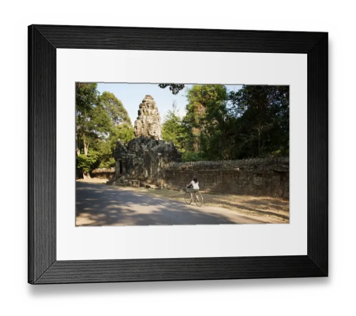 Framed Print : Biking around the Angkor Wat temple in Siem Reap Framed Print : Biking around the Angkor Wat temple in Siem Reap