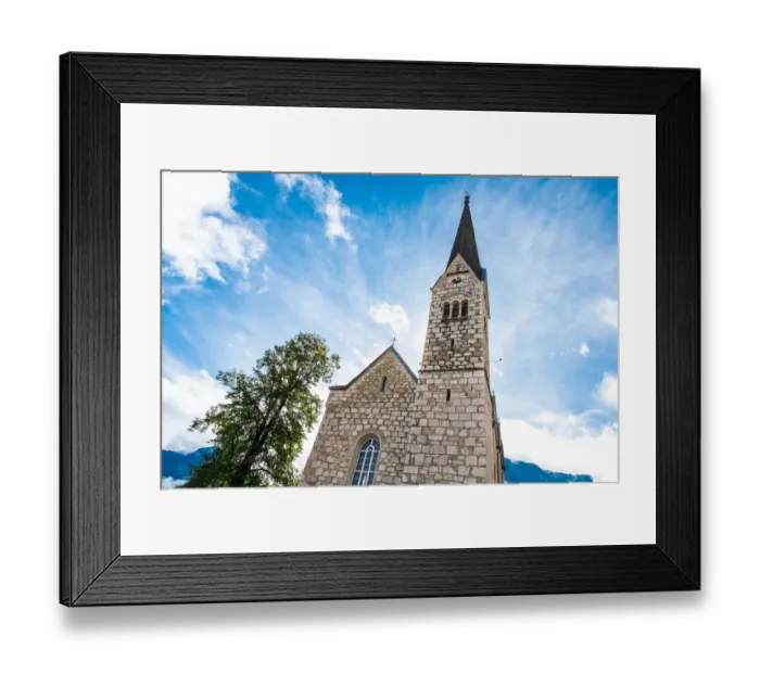 Framed Print : Hallstatt is a small village in Austria. It is located next to the HallstAÔé¼ttersee lake