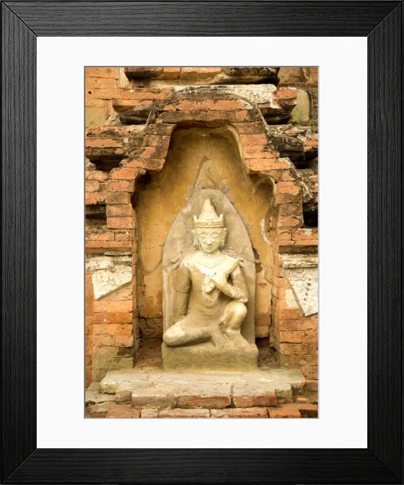 Framed Print : Stone Carved seated Buddha Framed Print : Stone Carved seated Buddha