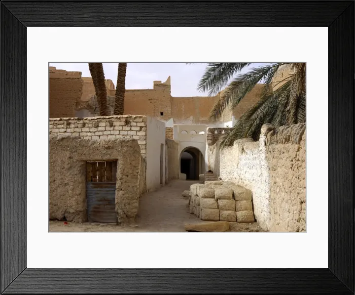 Framed Print : Lane with a pile of mud bricks in the backyards of the oasis of Ghadames, UNESCO world heritage, Libya Framed Print : Lane with a pile of mud bricks in the backyards of the oasis of Ghadames, UNESCO world heritage, Libya