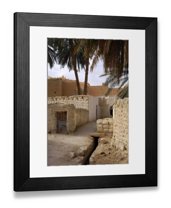 Framed Print : Lane with a pile of mud bricks in the backyards of the oasis of Ghadames, UNESCO world heritage, Libya Framed Print : Lane with a pile of mud bricks in the backyards of the oasis of Ghadames, UNESCO world heritage, Libya