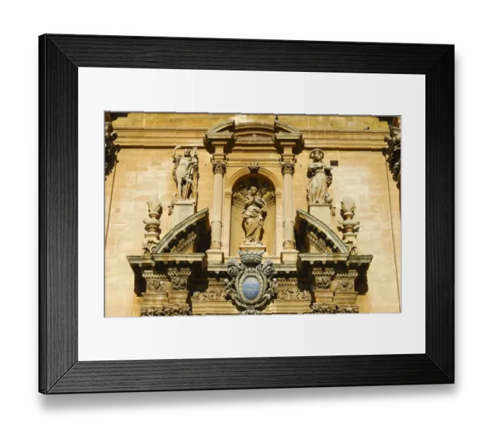 Framed Print : Detail of the upper part of the portal Cathedral San Giovanni Ragusa Italy