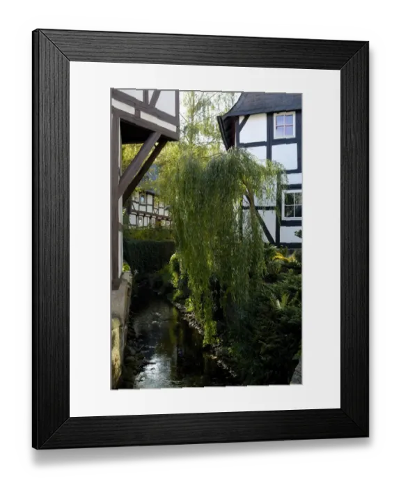 Framed Print : UNESCCO World Heritage Site picturesque old town framework houses at brook Goslar Lower Saxony Germany Framed Print : UNESCCO World Heritage Site picturesque old town framework houses at brook Goslar Lower Saxony Germany