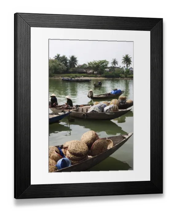 Framed Print : market boots with baskets on river Framed Print : market boots with baskets on river