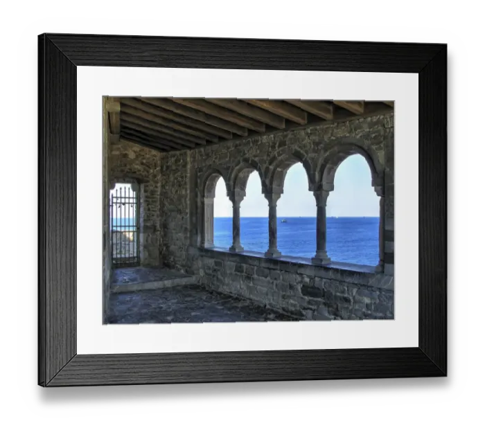 Framed Print : View through the romanesque loggia of St. Peter church in Porto Venere, Italy Framed Print : View through the romanesque loggia of St. Peter church in Porto Venere, Italy