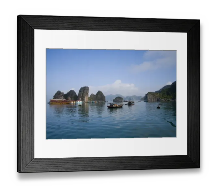 Framed Print : Floating Vietnamese fishing village with rocky coastline Framed Print : Floating Vietnamese fishing village with rocky coastline