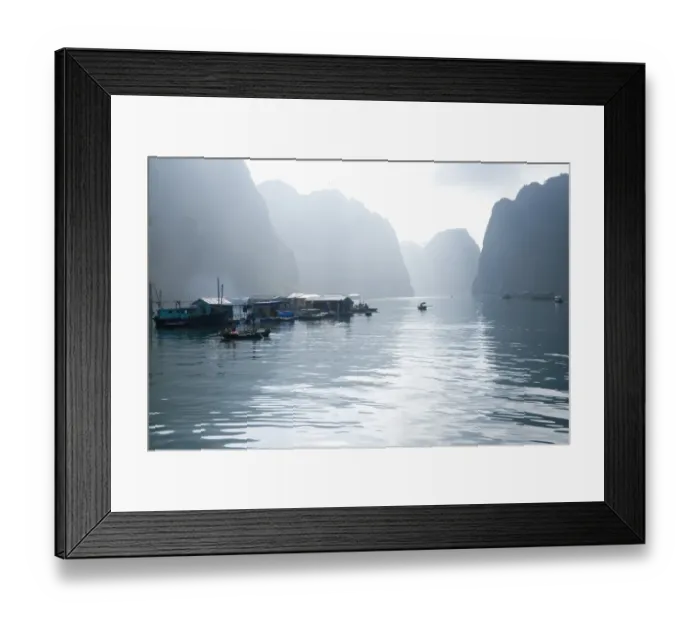 Framed Print : Floating Vietnamese fishing village with rocky coastline Framed Print : Floating Vietnamese fishing village with rocky coastline