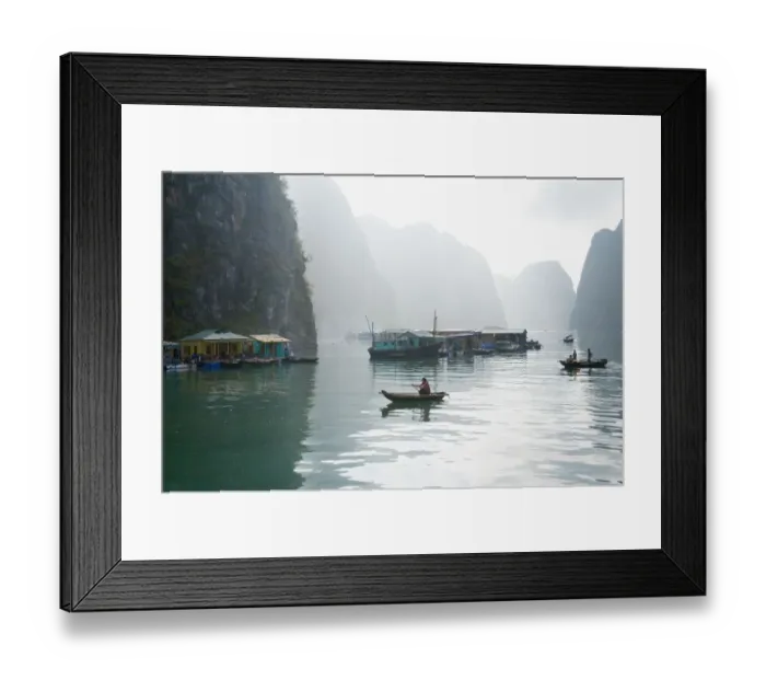 Framed Print : Floating Vietnamese fishing village with rocky coastline Framed Print : Floating Vietnamese fishing village with rocky coastline