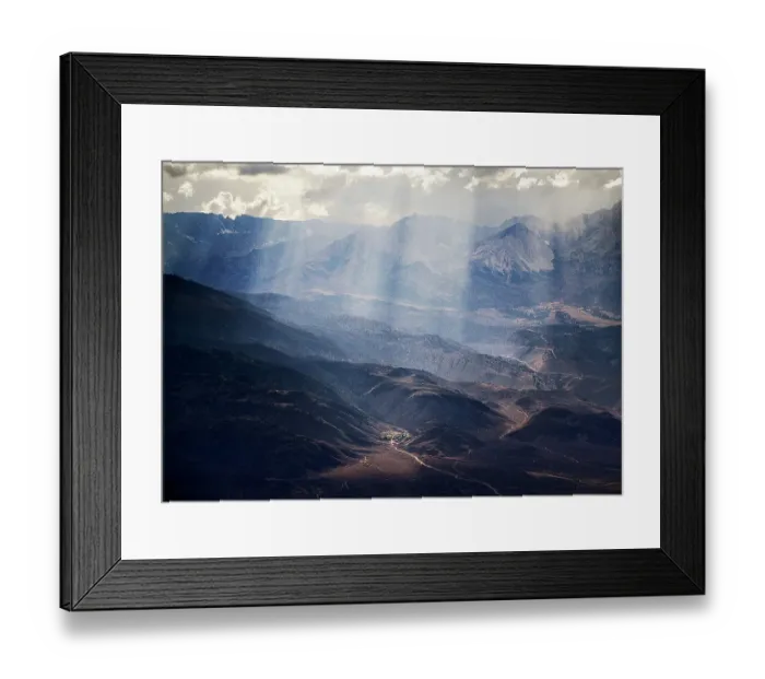 Framed Print : Sun shining above mountains and valleys Framed Print : Sun shining above mountains and valleys