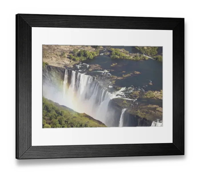 Framed Print : Zambezi River flowing over Victoria Falls, aerial view