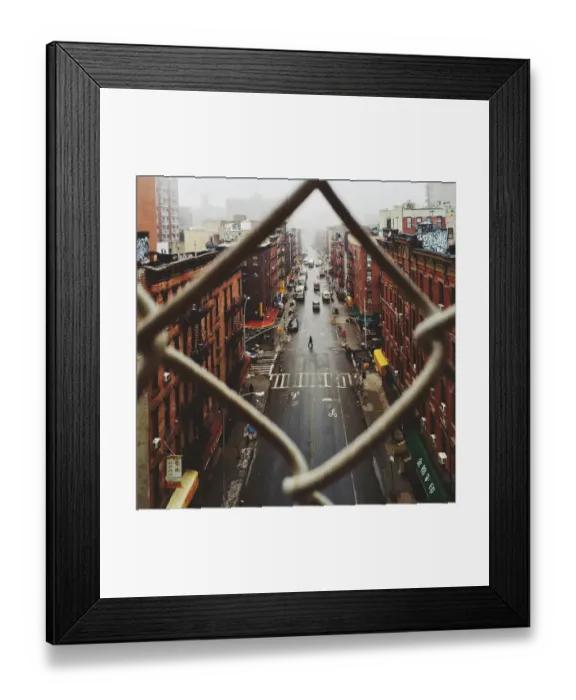 Framed Print : Chinatown seen through fence on a foggy day, NYC Framed Print : Chinatown seen through fence on a foggy day, NYC