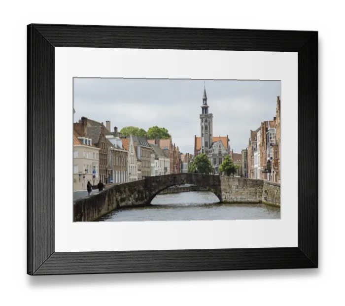 Framed Print : Old stone bridge across the canal in Bruges, West Flanders, Belgium Framed Print : Old stone bridge across the canal in Bruges, West Flanders, Belgium