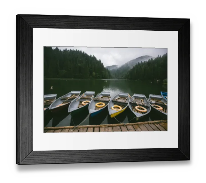 Framed Print : Rowing boats moored at the pier near mountain lake surrounded by misty forest Framed Print : Rowing boats moored at the pier near mountain lake surrounded by misty forest