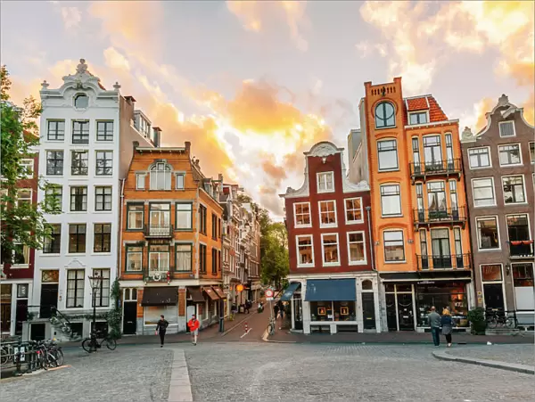 Traditional Dutch old houses in Amsterdam at sunset, Netherlands