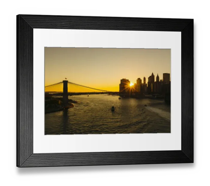 Framed Print : Sunset seen through Manhattan skyline, New York City, USA Framed Print : Sunset seen through Manhattan skyline, New York City, USA