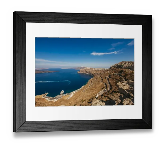 Framed Print : Curved road to Athinios port, Santorini, Greece Framed Print : Curved road to Athinios port, Santorini, Greece