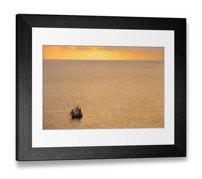Framed Print : Boat sailing in the sea during sunset Framed Print : Boat sailing in the sea during sunset