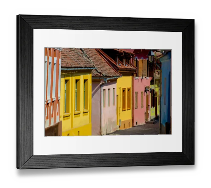 Framed Print : Multicolored street in Sighisoara, Transylvania Framed Print : Multicolored street in Sighisoara, Transylvania