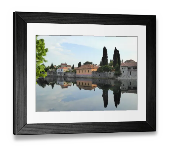 Framed Print : Trebinje reflected in the TrebiAanjica river, Bosnia and Herzegovina Framed Print : Trebinje reflected in the TrebiAanjica river, Bosnia and Herzegovina