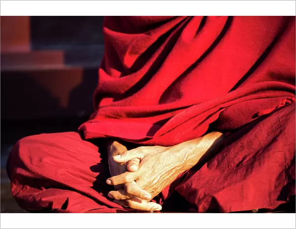 Close up of Burmese buddhist monk hands praying