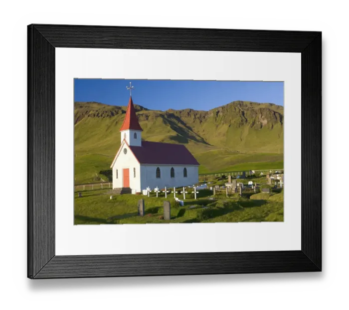Framed Print : Iceland, church and graveyard in mountainous landscape Framed Print : Iceland, church and graveyard in mountainous landscape