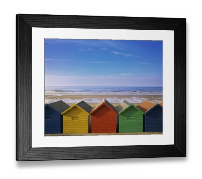 Framed Print : Painted Beach Huts in a Line, Whitby, England, UK Framed Print : Painted Beach Huts in a Line, Whitby, England, UK