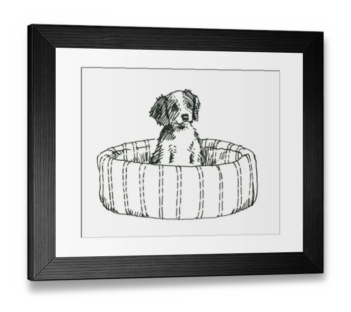 Framed Print : Black and white illustration of a puppy sitting up in a dog bed Framed Print : Black and white illustration of a puppy sitting up in a dog bed