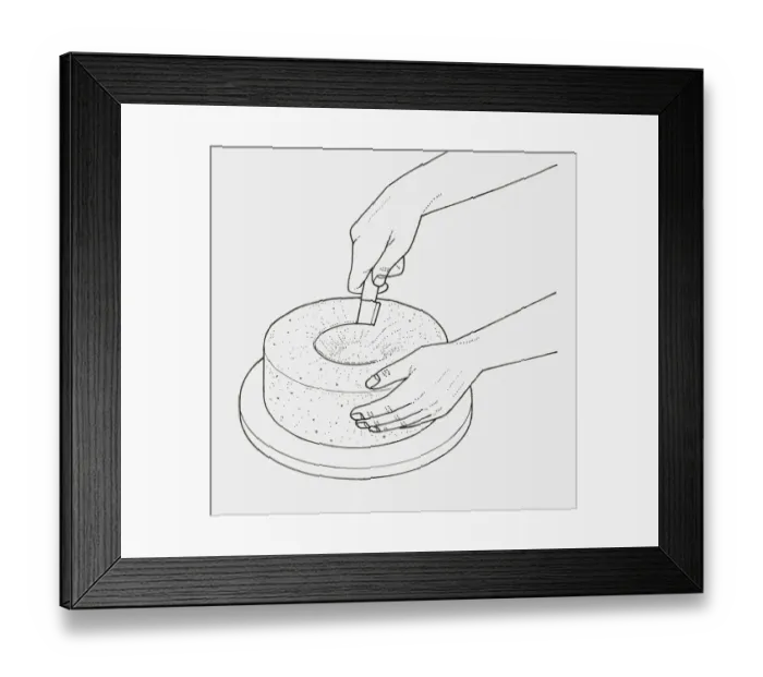 Framed Print : Black and white illustration of using knife to remove centre of cake