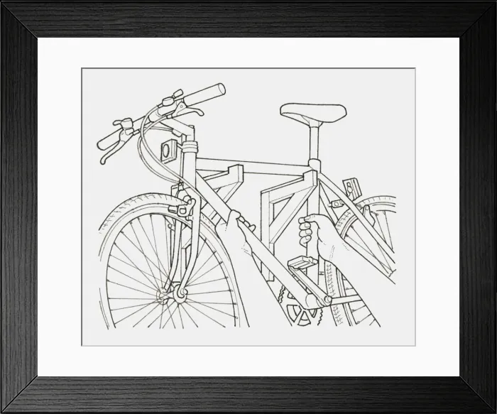 Framed Print : Black and white illustration of hands hanging a bicycle on a pair of brackets on a wall Framed Print : Black and white illustration of hands hanging a bicycle on a pair of brackets on a wall